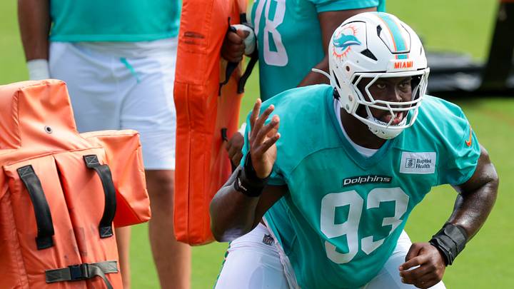 Miami Dolphins defensive tackle Zeek Biggers (93) works during practice at the Baptist Health Training Complex. Miami Dolphins defensive tackle Zeek Biggers (93) works during practice at the Baptist Health Training Complex.