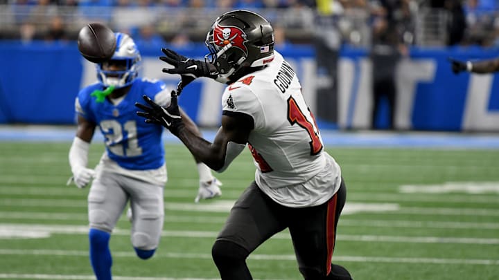 Sep 15, 2024; Detroit, Michigan, USA; Tampa Bay Buccaneers wide receiver Chris Godwin (14) catches a touchdown pass against the Detroit Lions in the second quarter at Ford Field. Mandatory Credit: Eamon Horwedel-Imagn Images