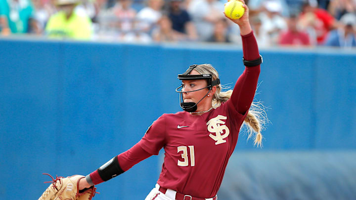 Florida State's Makenna Reid (31) throws a pitch during a softball game between Washington and