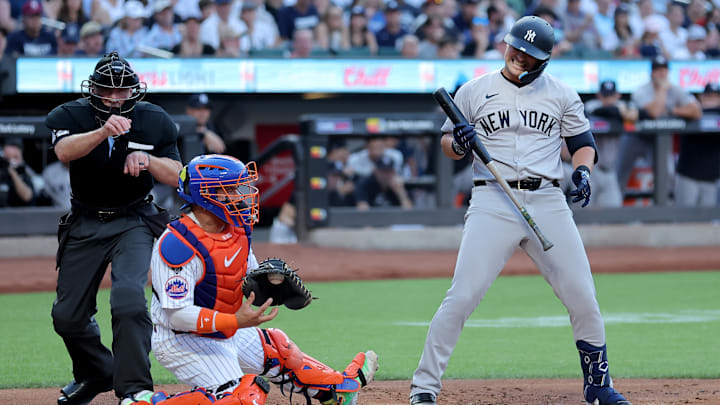 Jun 25, 2024; New York City, New York, USA; New York Yankees first baseman J.D. Davis (38) reacts after striking out to end the top of the first inning against the New York Mets at Citi Field. Mandatory Credit: Brad Penner-Imagn Images