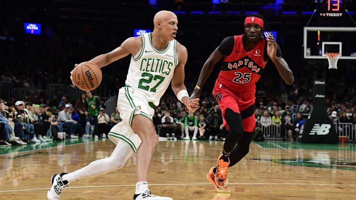 Oct 13, 2024; Boston, Massachusetts, USA; Boston Celtics guard Jordan Walsh (27) controls the ball while Toronto Raptors forward Chris Boucher (25) defends during the first half at TD Garden. Mandatory Credit: Bob DeChiara-Imagn Images Oct 13, 2024; Boston, Massachusetts, USA; Boston Celtics guard Jordan Walsh (27) controls the ball while Toronto Raptors forward Chris Boucher (25) defends during the first half at TD Garden. Mandatory Credit: Bob DeChiara-Imagn Images