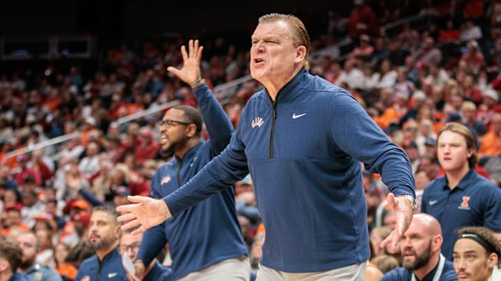 Nov 28, 2024; Kansas City, Missouri, USA; Illinois Fighting Illini coach Brad underwood reacts to game play during the first half against the Arkansas Razorbacks at T-Mobile Center. Mandatory Credit: William Purnell-Imagn Images Nov 28, 2024; Kansas City, Missouri, USA; Illinois Fighting Illini coach Brad underwood reacts to game play during the first half against the Arkansas Razorbacks at T-Mobile Center. Mandatory Credit: William Purnell-Imagn Images