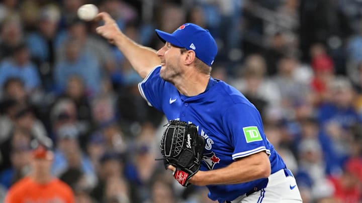 Mar 29, 2025; Toronto, Ontario, CAN; Toronto Blue Jays starting pitcher Max Scherzer (31) delivers a pitch against the Baltimore Orioles in the second inning at Rogers Centre.