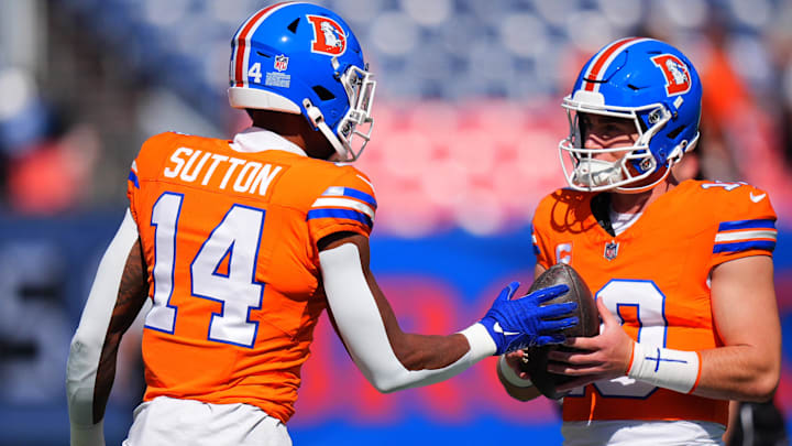 Oct 6, 2024; Denver, Colorado, USA; Denver Broncos wide receiver Courtland Sutton (14) and quarterback Bo Nix (10) before the game against the Las Vegas Raiders at Empower Field at Mile High. 