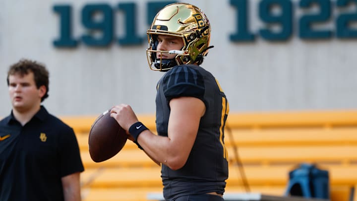 Aug 29, 2025; Waco, Texas, USA;  Baylor Bears quarterback Sawyer Robertson (13) warms up before the game against the Auburn Tigers at McLane Stadium. Mandatory Credit: Chris Jones-Imagn Images