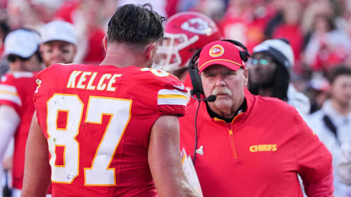 Nov 10, 2024; Kansas City, Missouri, USA; Kansas City Chiefs tight end Travis Kelce (87) talks with head coach Andy Reid against the Denver Broncos during the second half at GEHA Field at Arrowhead Stadium. Mandatory Credit: Denny Medley-Imagn Images