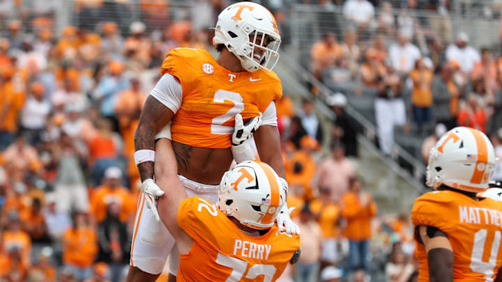 Sep 6, 2025; Knoxville, Tennessee, USA; Tennessee Volunteers running back Peyton Lewis (2) celebrates a touchdown against the East Tennessee State Buccaneers with offensive lineman Jesse Perry (72) during the first quarter at Neyland Stadium. Mandatory Credit: Randy Sartin-Imagn Images