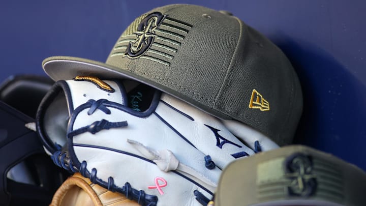 The Seattle Mariners Armed Forces Day hat is pictured in the dugout before a game against the Atlanta Braves on May 20, 2023, at Truist Park.