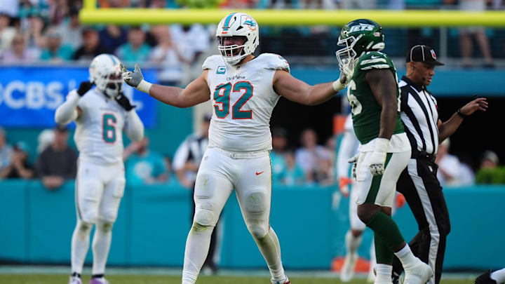 Miami Dolphins defensive tackle Zach Sieler (92) celebrates after sacking New York Jets quarterback Aaron Rodgers during the second half at Hard Rock Stadium in Week 14. Miami Dolphins defensive tackle Zach Sieler (92) celebrates after sacking New York Jets quarterback Aaron Rodgers during the second half at Hard Rock Stadium in Week 14.