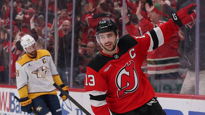 Jan 29, 2026; Newark, New Jersey, USA; New Jersey Devils center Nico Hischier (13) celebrates his overtime game winning goal against the Nashville Predators at Prudential Center. Mandatory Credit: Ed Mulholland-Imagn Images