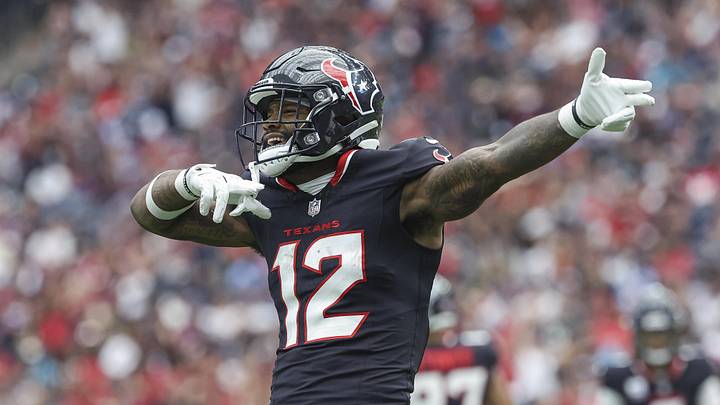 Sep 29, 2024; Houston, Texas, USA; Houston Texans wide receiver Nico Collins (12) signals after a first down during the first quarter against the Jacksonville Jaguars at NRG Stadium. Mandatory Credit: Troy Taormina-Imagn Images