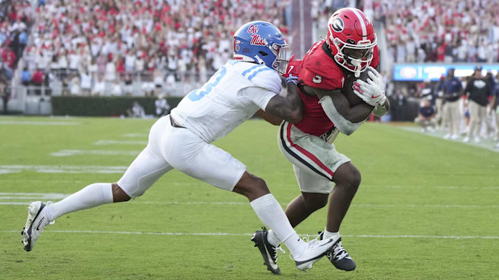Oct 18, 2025; Athens, Georgia, USA; Georgia Bulldogs running back Nate Frazier (3) scores a touchdown against Mississippi Rebels safety Sage Ryan (3) during the second half of the game at Sanford Stadium. Mandatory Credit: Dale Zanine-Imagn Images Oct 18, 2025; Athens, Georgia, USA; Georgia Bulldogs running back Nate Frazier (3) scores a touchdown against Mississippi Rebels safety Sage Ryan (3) during the second half of the game at Sanford Stadium. Mandatory Credit: Dale Zanine-Imagn Images