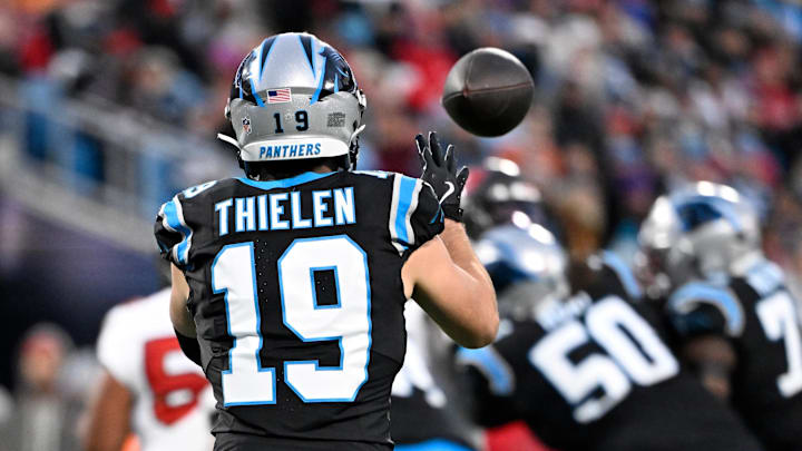 Dec 1, 2024; Charlotte, North Carolina, USA;  Carolina Panthers wide receiver Adam Thielen (19) catches the ball in the second quarter at Bank of America Stadium. Mandatory Credit: Bob Donnan-Imagn Images