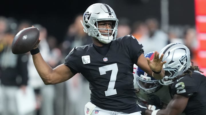 Dec 28, 2025; Paradise, Nevada, USA; Las Vegas Raiders quarterback Geno Smith (7) throws in the third quarter against the New York Giants at Allegiant Stadium. Mandatory Credit: Kirby Lee-Imagn Images
