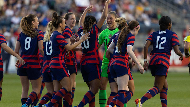 Apr 12, 2022; Chester, Pennsylvania, USA; United States midfielder Catarina Macario (20) celebrates with her team after scoring against Uzbekistan during the first half of an international friendly women's soccer match at Subaru Park. Mandatory Credit: Bill Streicher-Imagn Images