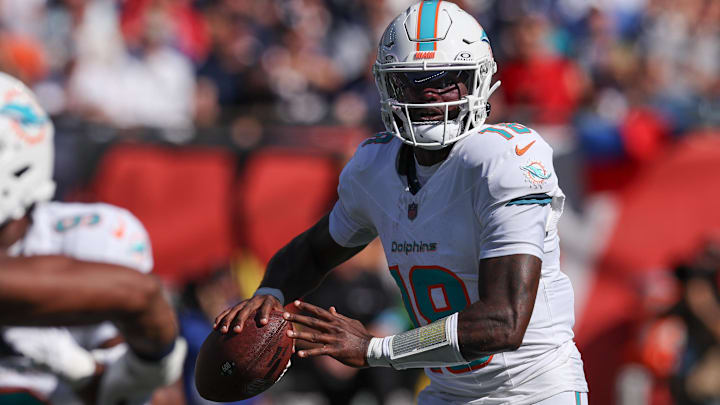 Miami Dolphins quarterback Tyler Huntley (18) throws the ball during the first half against the New England Patriots at Gillette Stadium. Miami Dolphins quarterback Tyler Huntley (18) throws the ball during the first half against the New England Patriots at Gillette Stadium.
