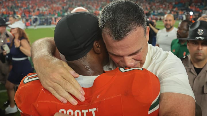 Aug 31, 2025; Miami Gardens, Florida, USA; Miami Hurricanes head coach Mario Cristobal reacts after defeating the Notre Dame Fighting Irish at Hard Rock Stadium. Mandatory Credit: Sam Navarro-Imagn Images