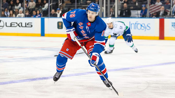 Mar 22, 2025; New York, New York, USA; New York Rangers left wing Brennan Othmann (78) skates against the Vancouver Canucks during the third period at Madison Square Garden. Mandatory Credit: Danny Wild-Imagn Images