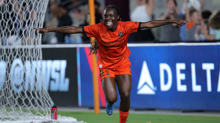 Aug 27, 2022; Houston, Texas, USA; Houston Dash forward Michelle Alozie (22) celebrates her goal