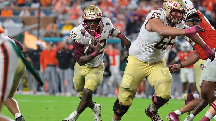 Oct 17, 2026; Miami Gardens, Florida, USA; Florida State Seminoles running back Ousmane Kromah (32) runs during the second quarter against the Miami Hurricanes at Hard Rock Stadium. Mandatory Credit: Sam Navarro-Imagn Images Oct 17, 2026; Miami Gardens, Florida, USA; Florida State Seminoles running back Ousmane Kromah (32) runs during the second quarter against the Miami Hurricanes at Hard Rock Stadium. Mandatory Credit: Sam Navarro-Imagn Images