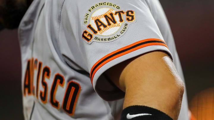 Jul 18, 2023; Cincinnati, Ohio, USA; The San Francisco Giants logo on the sleeve of right fielder Michael Conforto (8) during the fifth inning against the Cincinnati Reds at Great American Ball Park. Mandatory Credit: Katie Stratman-Imagn Images