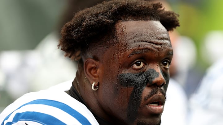 Kwity Paye of the Indianapolis Colts looks on