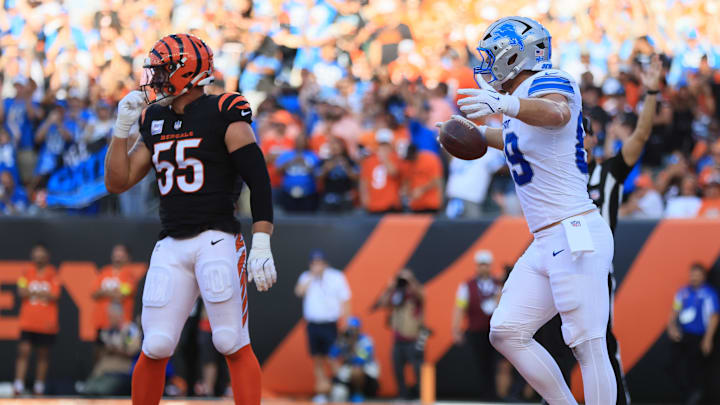 Oct 5, 2025; Cincinnati, Ohio, USA; Detroit Lions tight end Brock Wright (89) runs for a touchdown past Cincinnati Bengals linebacker Logan Wilson (55) during the second quarter at Paycor Stadium. Mandatory Credit: Katie Stratman-Imagn Images