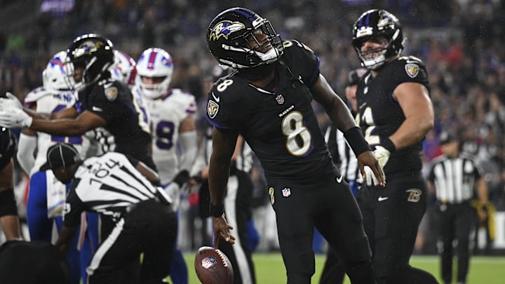 Sep 29, 2024; Baltimore, Maryland, USA;  Baltimore Ravens quarterback Lamar Jackson (8) celebrates after a  fullback Patrick Ricard (42) touchdown during the second half against the Buffalo Bills at M&T Bank Stadium. Mandatory Credit: Tommy Gilligan-Imagn Images