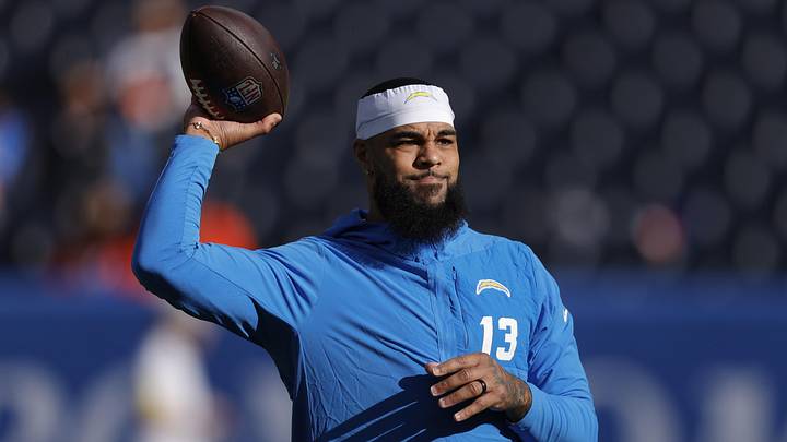 Jan 4, 2026; Denver, Colorado, USA; Los Angeles Chargers wide receiver Keenan Allen (13) warms up before the game against the Denver Broncos at Empower Field at Mile High. Mandatory Credit: Isaiah J. Downing-Imagn Images