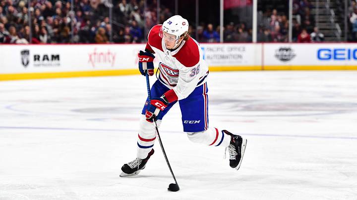 Feb 14, 2018; Denver, CO, USA; Montreal Canadiens right wing Nikita Scherbak (38) takes a shot on goal in the third period against the Colorado Avalanche at the Pepsi Center. Mandatory Credit: Ron Chenoy-Imagn Images