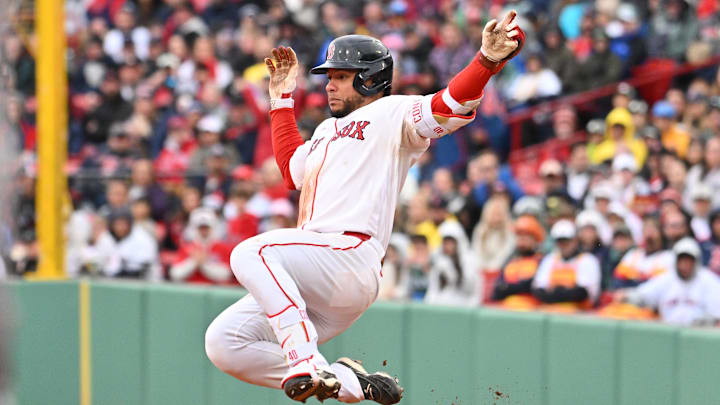 May 3, 2026; Boston, Massachusetts, USA; Boston Red Sox first baseman Willson Contreras (40) slides into second base during the seventh inning against the Houston Astros at Fenway Park. Mandatory Credit: Eric Canha-Imagn Images