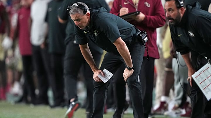 Dec 30, 2023; Miami Gardens, FL, USA; Florida State Seminoles head coach Mike Norvell reacts against
