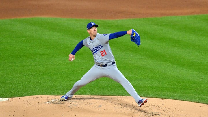 Oct 16, 2024; New York City, New York, USA; Los Angeles Dodgers pitcher Walker Buehler (21) throws a pitch against the New York Mets in the first inning during game three of the NLCS for the 2024 MLB playoffs at Citi Field. 