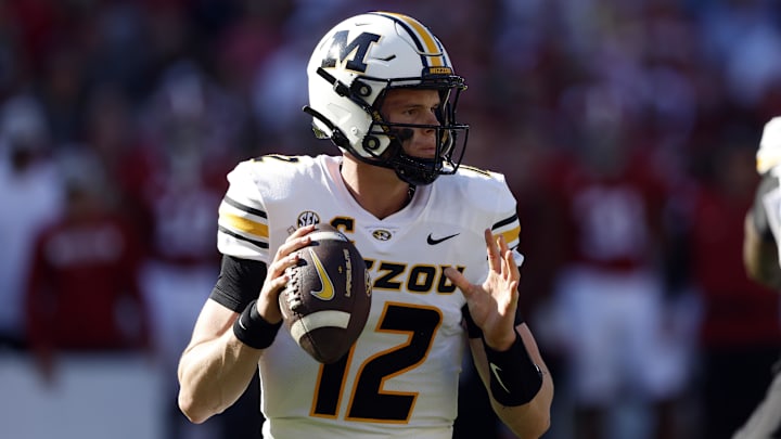 Oct 26, 2024; Tuscaloosa, Alabama, USA;  Missouri Tigers quarterback Brady Cook (12) throws a pass during the first half against the Alabama Crimson Tide at Bryant-Denny Stadium. Mandatory Credit: Butch Dill-Imagn Images