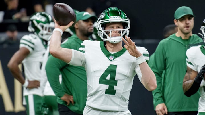 Dec 21, 2025; New Orleans, Louisiana, USA; New York Jets quarterback Brady Cook (4) throws before a game against the New Orleans Saints at Caesars Superdome. Mandatory Credit: Matthew Hinton-Imagn Images