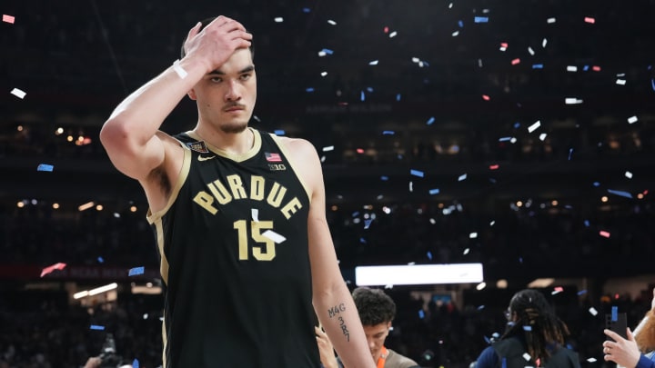 A dejected Purdue Boilermakers center Zach Edey (15) walks off the court after losing the Men's NCAA national championship game to Connecticut Huskies at State Farm Stadium in Glendale on April 8, 2024.