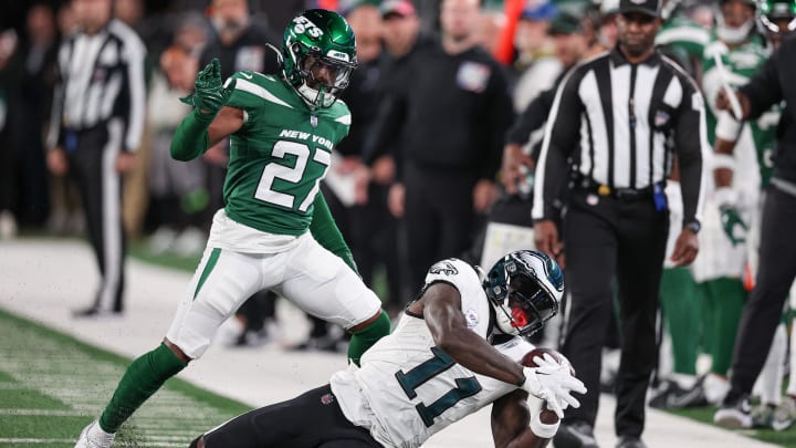 Oct 15, 2023; East Rutherford, New Jersey, USA; Philadelphia Eagles wide receiver A.J. Brown (11) catches the ball as New York Jets cornerback Tae Hayes (27) defends during the second half at MetLife Stadium