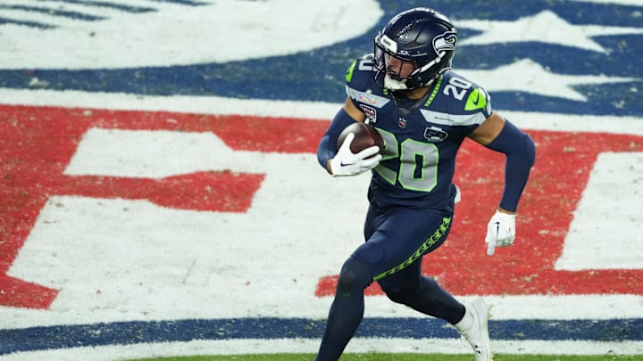 Feb 8, 2026; Santa Clara, CA, USA; Seattle Seahawks safety Julian Love (20) returns an interception against the New England Patriots in the second half in Super Bowl LX at Levi's Stadium. Mandatory Credit: Kirby Lee-Imagn Images