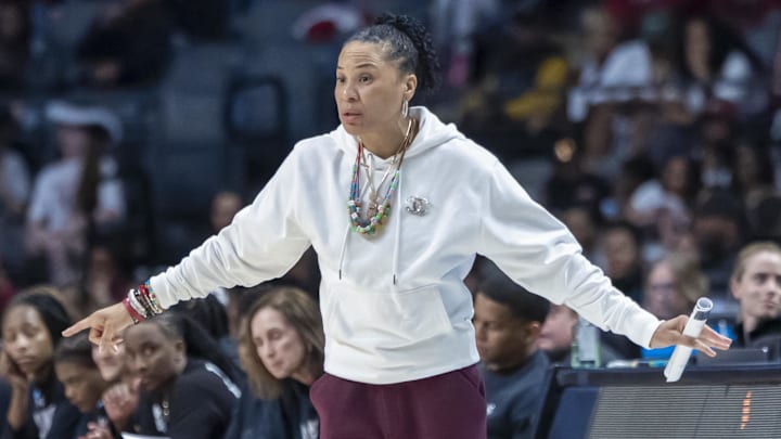 Mar 30, 2025; Birmingham, AL, USA; South Carolina Gamecocks head coach Dawn Staley signals to her team during the first half of an Elite 8 NCAA Tournament basketball game against the Duke Blue Devils at Legacy Arena. Mandatory Credit: Vasha Hunt-Imagn Images Mar 30, 2025; Birmingham, AL, USA; South Carolina Gamecocks head coach Dawn Staley signals to her team during the first half of an Elite 8 NCAA Tournament basketball game against the Duke Blue Devils at Legacy Arena. Mandatory Credit: Vasha Hunt-Imagn Images