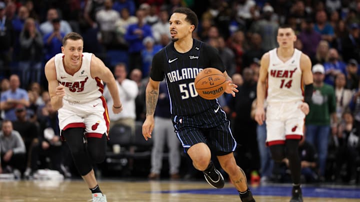 Orlando Magic guard Cole Anthony (50) controls the ball against the Miami Heat in the fourth quarter at Kia Center.