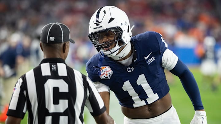 Dec 31, 2024; Glendale, AZ, USA; Penn State Nittany Lions defensive end Abdul Carter (11) greets a referee prior to the game against the Boise State Broncos in the Fiesta Bowl at State Farm Stadium. Mandatory Credit: Mark J. Rebilas-Imagn Images Dec 31, 2024; Glendale, AZ, USA; Penn State Nittany Lions defensive end Abdul Carter (11) greets a referee prior to the game against the Boise State Broncos in the Fiesta Bowl at State Farm Stadium. Mandatory Credit: Mark J. Rebilas-Imagn Images