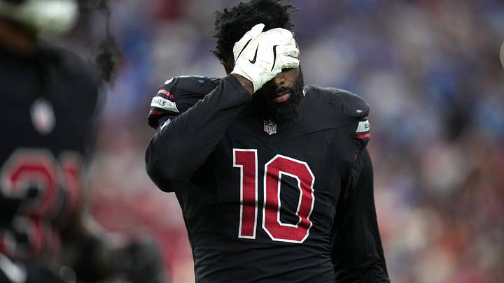Arizona Cardinals linebacker Josh Sweat (10) walks off the field after the defense gives up a touchdown to the Detroit Lions at State Farm Stadium in Glendale on Oct. 11, 2026. Arizona Cardinals linebacker Josh Sweat (10) walks off the field after the defense gives up a touchdown to the Detroit Lions at State Farm Stadium in Glendale on Oct. 11, 2026.