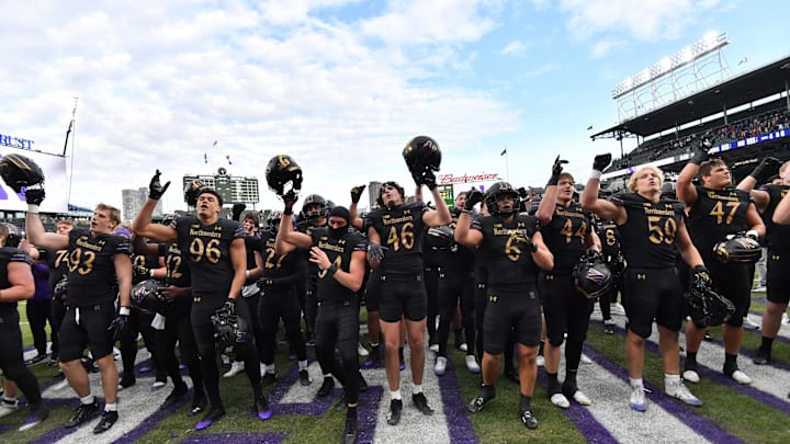 The Northwestern Wildcats celebrate after their victory against the Minnesota Golden Gophers