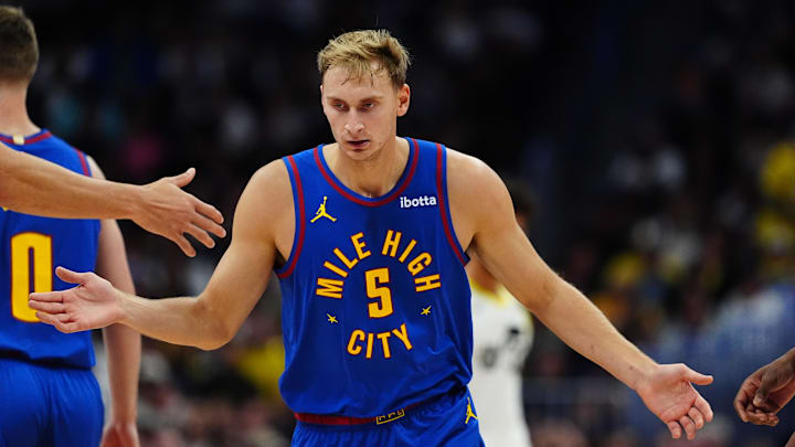Nov 2, 2024; Denver, Colorado, USA; Denver Nuggets forward Hunter Tyson (5) during the first half against the Utah Jazz at Ball Arena. Nov 2, 2024; Denver, Colorado, USA; Denver Nuggets forward Hunter Tyson (5) during the first half against the Utah Jazz at Ball Arena.