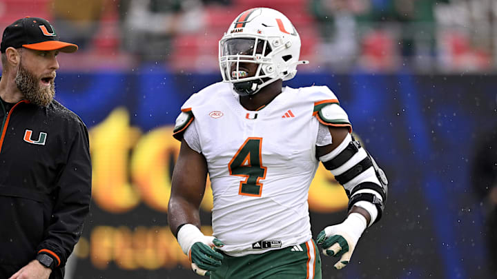 Nov 1, 2025; Dallas, Texas, USA; SMU Miami Hurricanes defensive lineman Rueben Bain Jr. (4) warms up before the game against the SMU Mustangs at Gerald J. Ford Stadium. Mandatory Credit: Jerome Miron-Imagn Images Nov 1, 2025; Dallas, Texas, USA; SMU Miami Hurricanes defensive lineman Rueben Bain Jr. (4) warms up before the game against the SMU Mustangs at Gerald J. Ford Stadium. Mandatory Credit: Jerome Miron-Imagn Images