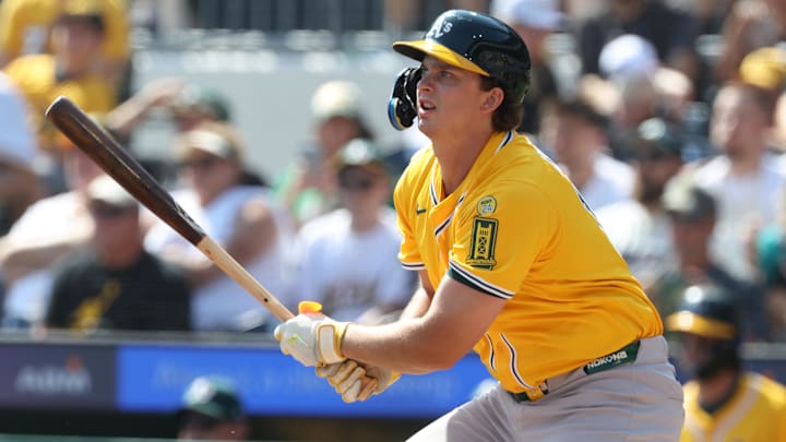 Sep 21, 2025; Pittsburgh, Pennsylvania, USA;  Athletics first baseman Nick Kurtz (16) hits a single against the Pittsburgh Pirates during the first inning at PNC Park. Mandatory Credit: Charles LeClaire-Imagn Images