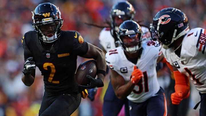 Oct 27, 2024; Landover, Maryland, USA; Washington Commanders wide receiver Dyami Brown (2) runs the ball after a catch during the first half against the Chicago Bears at Commanders Field. Mandatory Credit: Peter Casey-Imagn Images