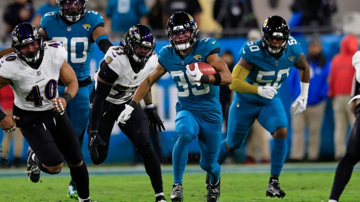 Jacksonville Jaguars wide receiver Jamal Agnew (39) rushes for yards during the second quarter of a regular season NFL football matchup Sunday, Dec. 17, 2023 at EverBank Stadium in Jacksonville, Fla. The Baltimore Ravens defeated the Jacksonville Jaguars 23-7. [Corey Perrine/Florida Times-Union]