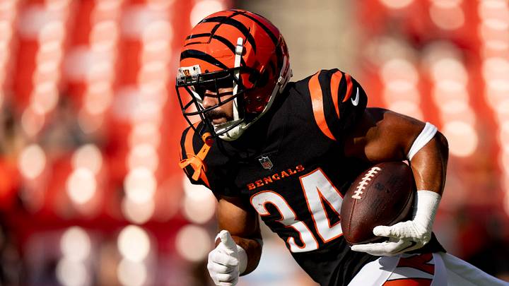 Aug 26, 2023; Landover, Maryland, USA; Cincinnati Bengals running back Jacob Saylors (34) runs with the ball before the NFL preseason week 3 game between the Cincinnati Bengals and the Washington Commanders at FedEx Field. Mandatory Credit: Albert Cesare-USA TODAY Sports Aug 26, 2023; Landover, Maryland, USA; Cincinnati Bengals running back Jacob Saylors (34) runs with the ball before the NFL preseason week 3 game between the Cincinnati Bengals and the Washington Commanders at FedEx Field. Mandatory Credit: Albert Cesare-USA TODAY Sports
