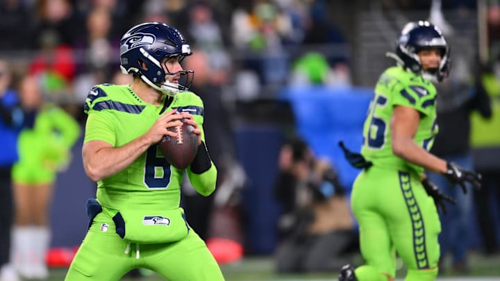 Dec 15, 2024; Seattle, Washington, USA; Seattle Seahawks quarterback Sam Howell (6) looks to pass the ball against the Green Bay Packers during the second half at Lumen Field. Mandatory Credit: Steven Bisig-Imagn Images Dec 15, 2024; Seattle, Washington, USA; Seattle Seahawks quarterback Sam Howell (6) looks to pass the ball against the Green Bay Packers during the second half at Lumen Field. Mandatory Credit: Steven Bisig-Imagn Images